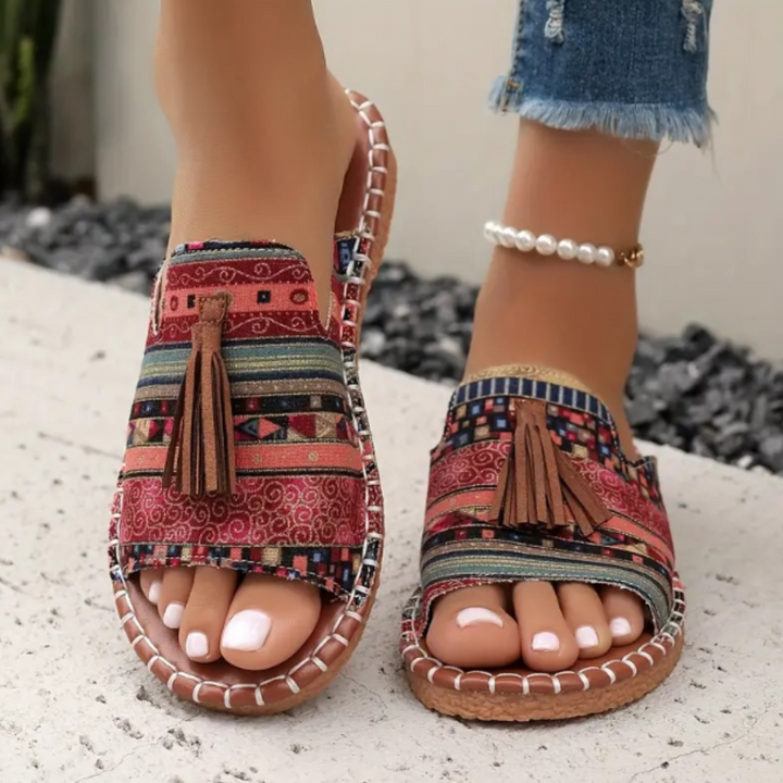 Women's comfy flat slip-on sandals for everyday casual summer wear.