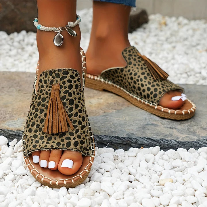 Comfortable women's everyday flat sandals, easy slip-on style for casual summer outfits.