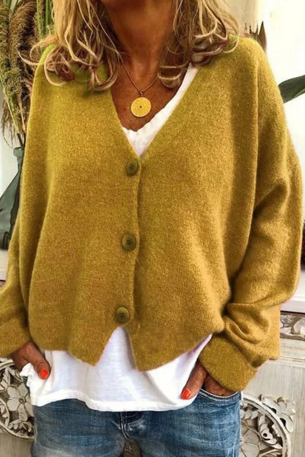 Modern women's button cardigan. Stay cozy and chic with this comfy long sleeve everyday sweater.