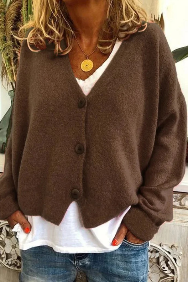 Versatile women's button cardigan. A cozy sweater and stylish outerwear, perfect for everyday wear.