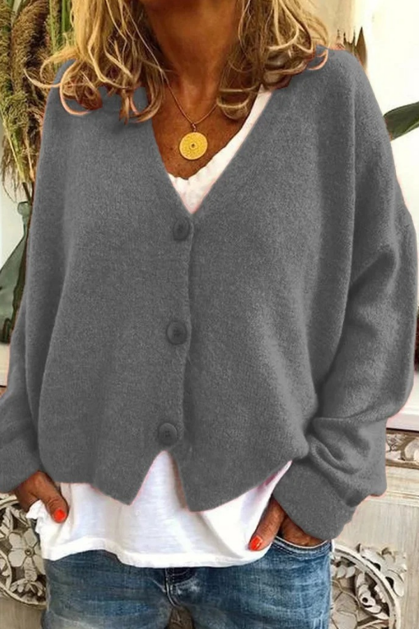 Chic women's button-front cardigan. A warm, cozy sweater for stylish winter wear.