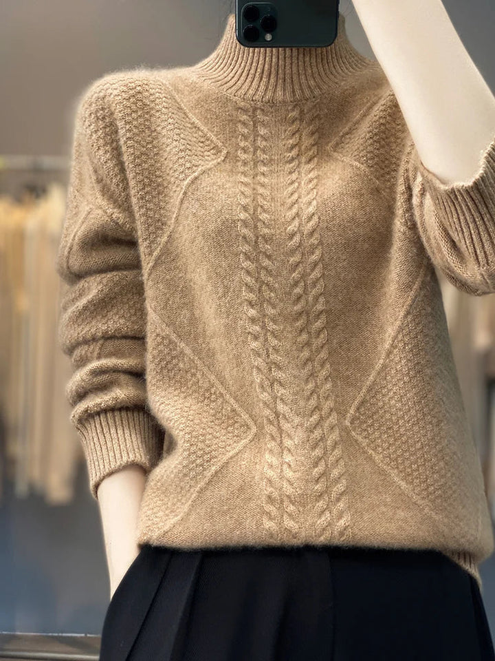 Soft women's cozy cable-knit turtleneck sweater, a warm elegant top perfect for comfortable winter outfits.