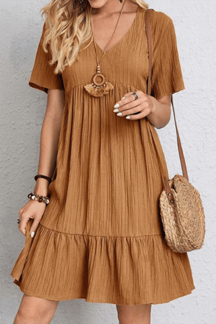Chic women's midi dress, ideal for everyday fashion & travel. Elegant, comfortable, & versatile style.