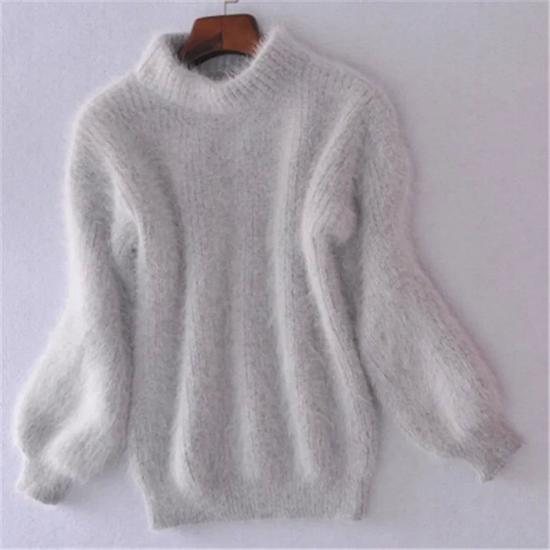 Soft knit women's pullover sweater for everyday comfort. Cozy long sleeve top, ideal for winter & fall wear style.