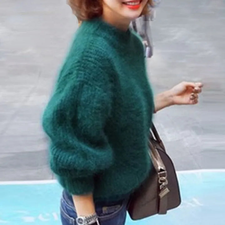 Stylish women's fall/winter pullover sweater. Cozy long sleeve top, perfect for everyday comfort & versatile fashion.
