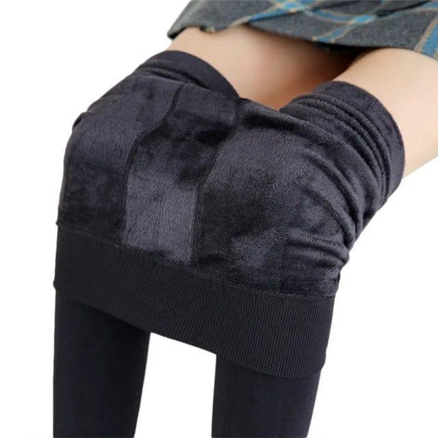 Women's stretch-fit fleece-lined winter leggings, great for activewear & staying warm in cold.