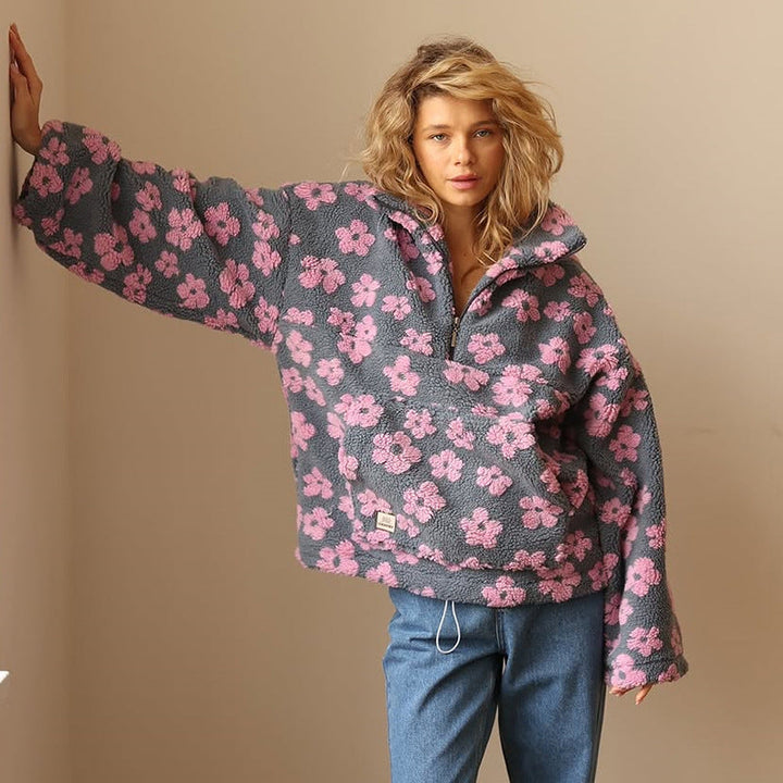 Cozy women's sherpa fleece sweater with floral design. Ideal for fall & winter fashion, casual wear.
