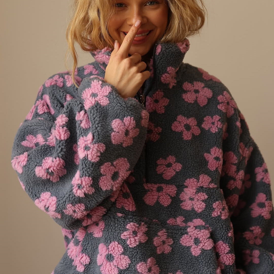 Women's warm floral sherpa pullover. Cozy fleece top, excellent for winter fashion and casual outings.