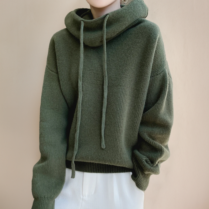 Elegant women's knit high neck sweater. Ideal for casual wear or sophisticated layering during cold weather.