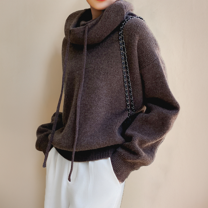Stylish women's turtleneck knit sweater, designed for elegant layering. Perfect long sleeve top for cool weather.
