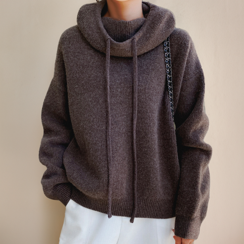 Versatile women's high neck knit sweater. A cozy, long sleeve top ideal for casual wear, winter fashion, and layering.
