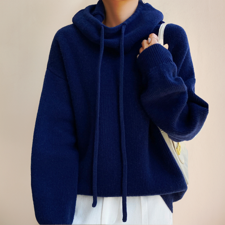 Comfortable women's knit sweater with a high neck and long sleeves. A cozy turtleneck for stylish winter layering.