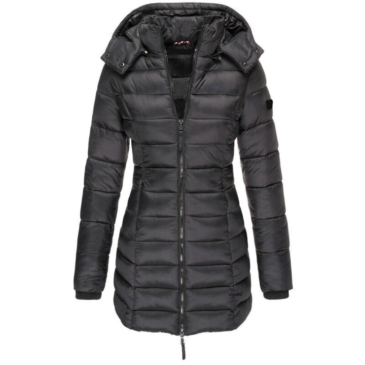 Soft women's cozy hooded winter coat, insulated for superior warmth and protection against cold weather.