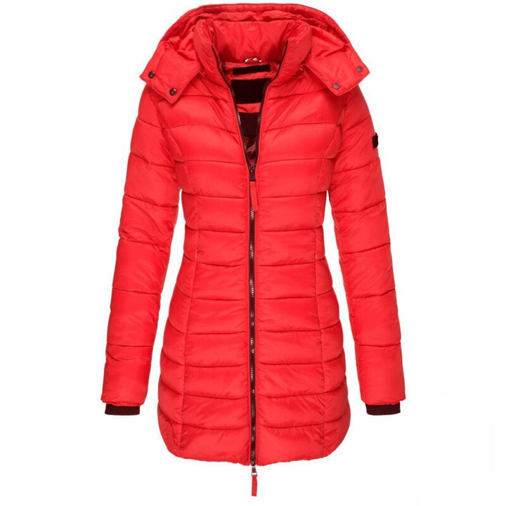 Durable women's insulated hooded winter jacket, essential outerwear for extreme cold and fall fashion.