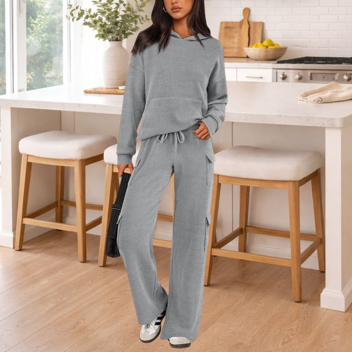 Casual women's soft knit lounge set, including a long-sleeved hoodie and fashionable wide-leg pants.