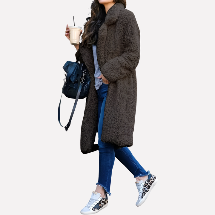 Soft ivory women's longline teddy coat, featuring a stylish notched collar for ultimate cozy comfort.