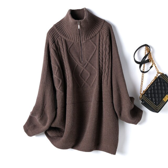Close-up of a women's soft knit oversized pullover sweater, showcasing the cozy texture and relaxed design.