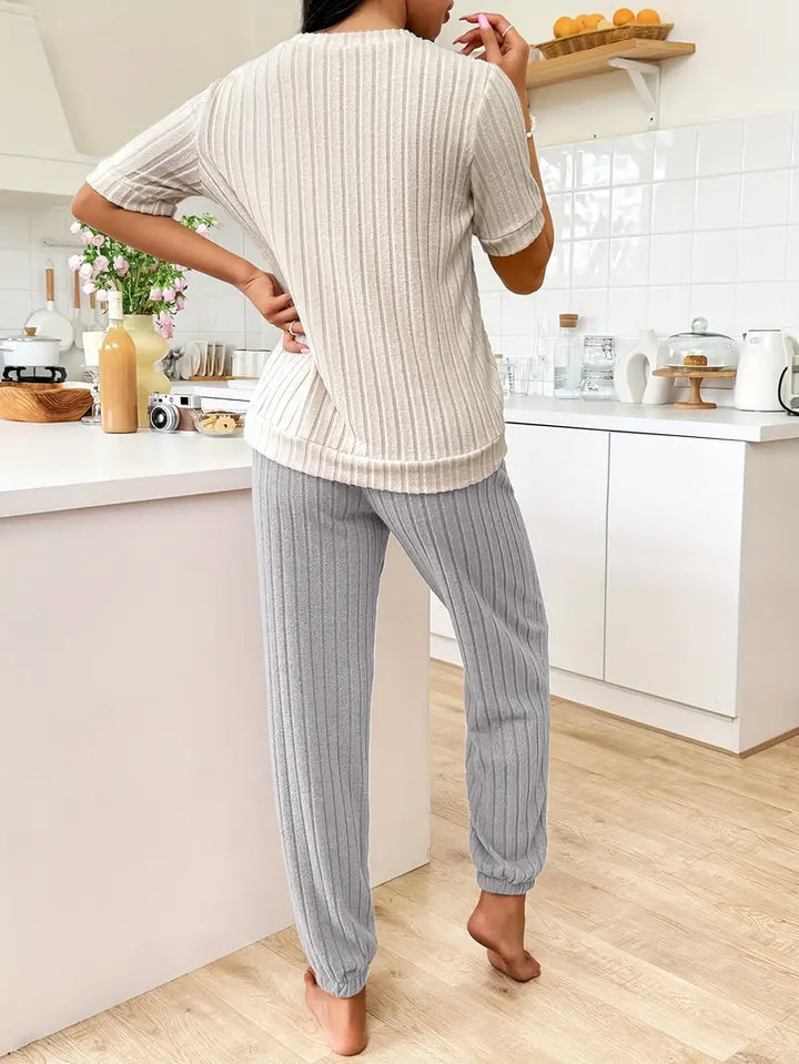 Ribbed women's loungewear set with a unique heart motif, offering cozy comfort and stylish casual wear.