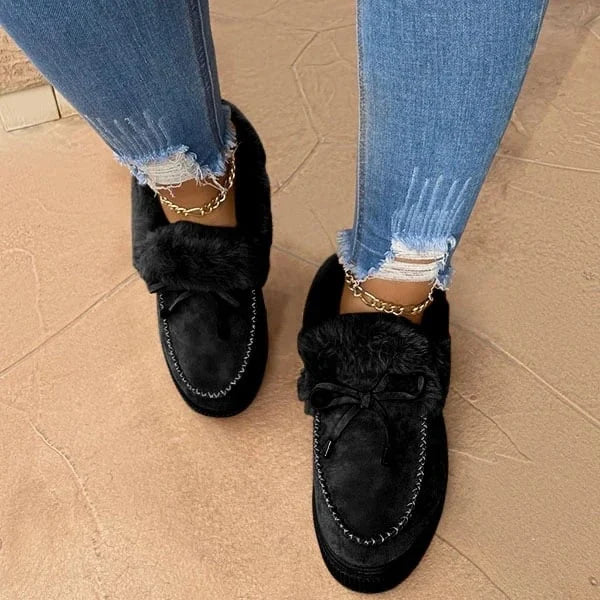 Soft cotton women's slip-on winter shoes, round-toe design for cozy comfort. Ideal everyday casual footwear.