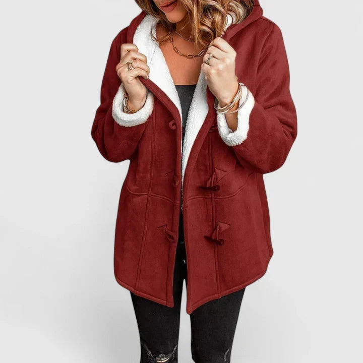 Women's hooded winter coat in a cozy fabric. Stay warm and stylish with this casual fall fashion outerwear.