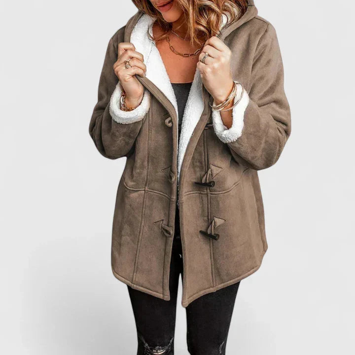 Soft, warm women's winter coat with a comfortable texture. Cozy toggle jacket, ideal for cold weather outerwear.