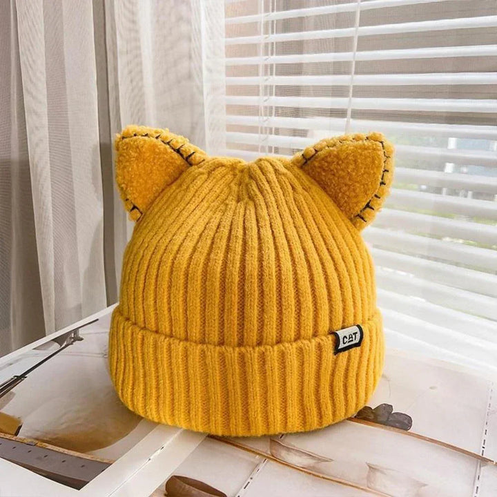 Warm women's cat ears beanie, a cozy winter hat for stylish cold weather protection & playful fashion.