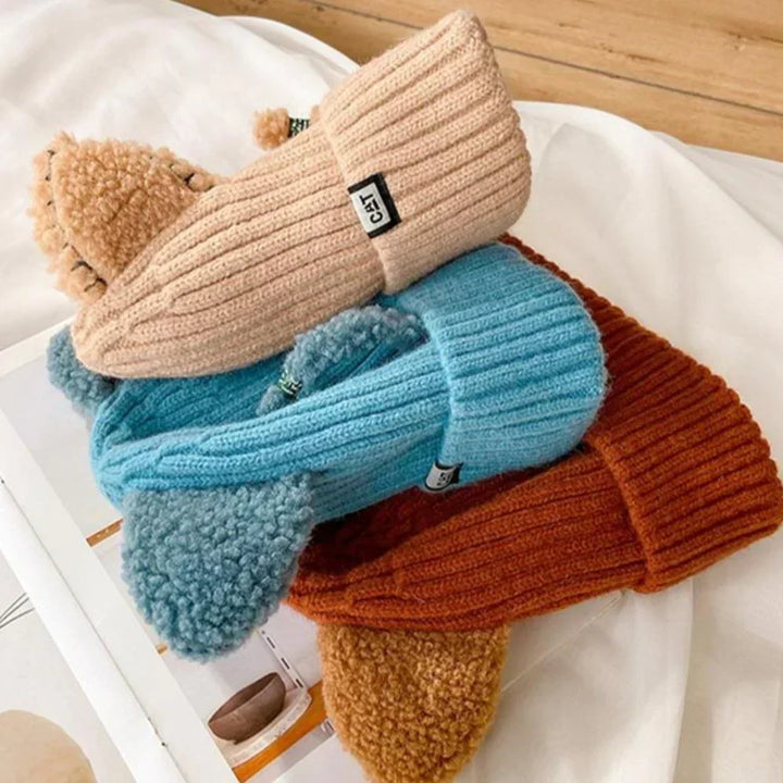 Soft knit women's cat ears beanie, a cozy winter hat, ideal for warm headwear & playful cold weather fashion.