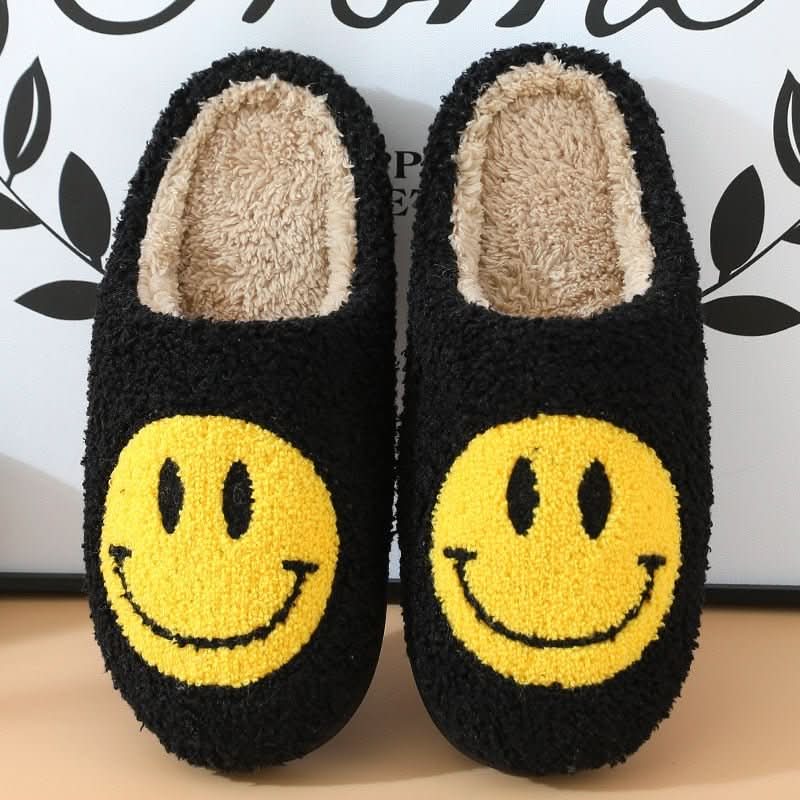 Soft women's winter slippers with a thick, supportive sole and an embroidered smiley face for home wear.