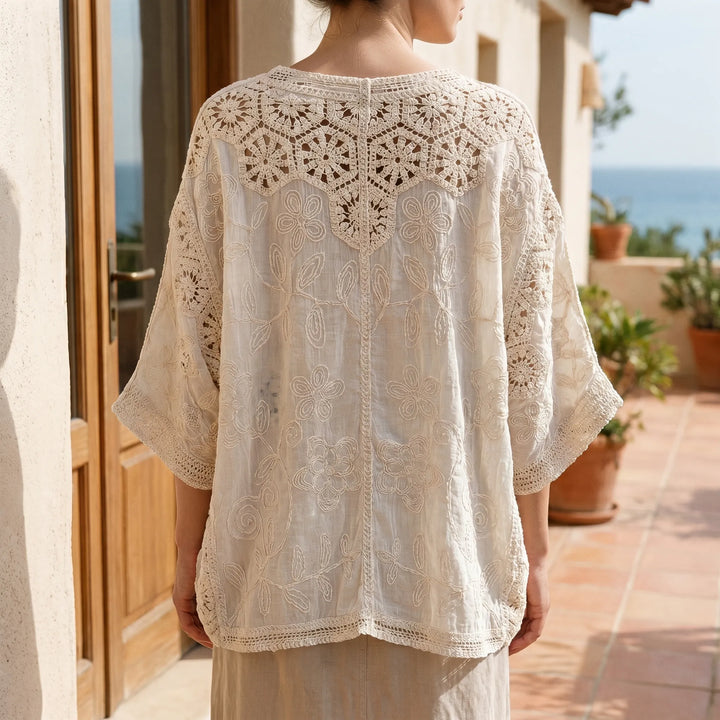 Women's cream bohemian open-front cardigan with three-quarter sleeves & textured knit. Perfect lightweight summer layer.
