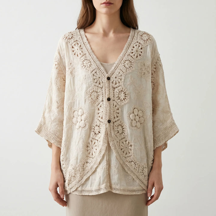 Relaxed fit women's bohemian cream cardigan. Lightweight open-front design with three-quarter sleeves for summer.