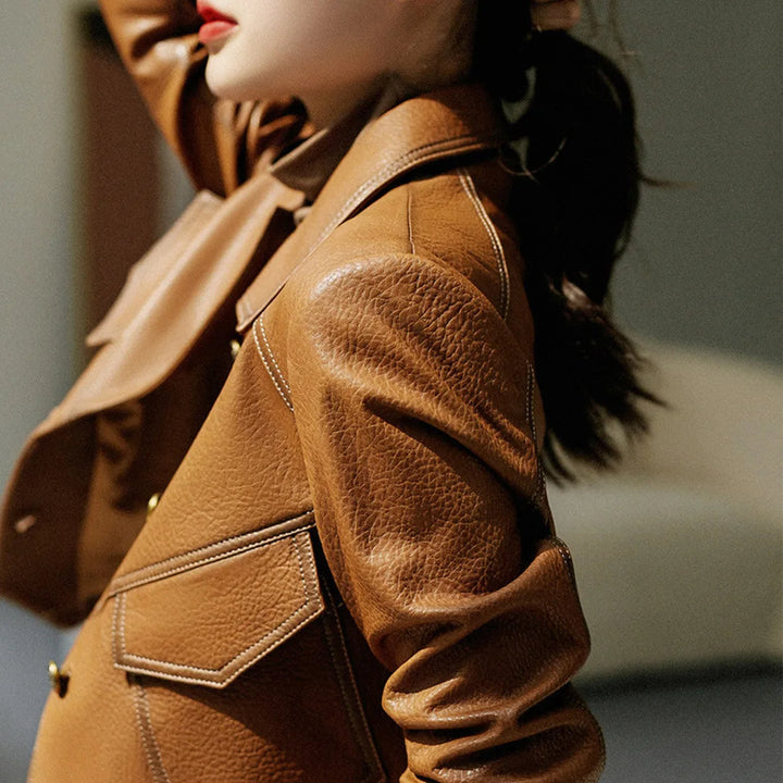 Chic black women's cropped blazer jacket with structured lapel, perfect for stylish outerwear.