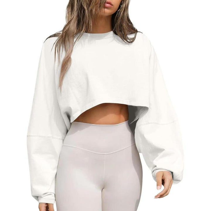 Women's comfortable cropped oversized crewneck pullover, essential for a relaxed modern athleisure look.