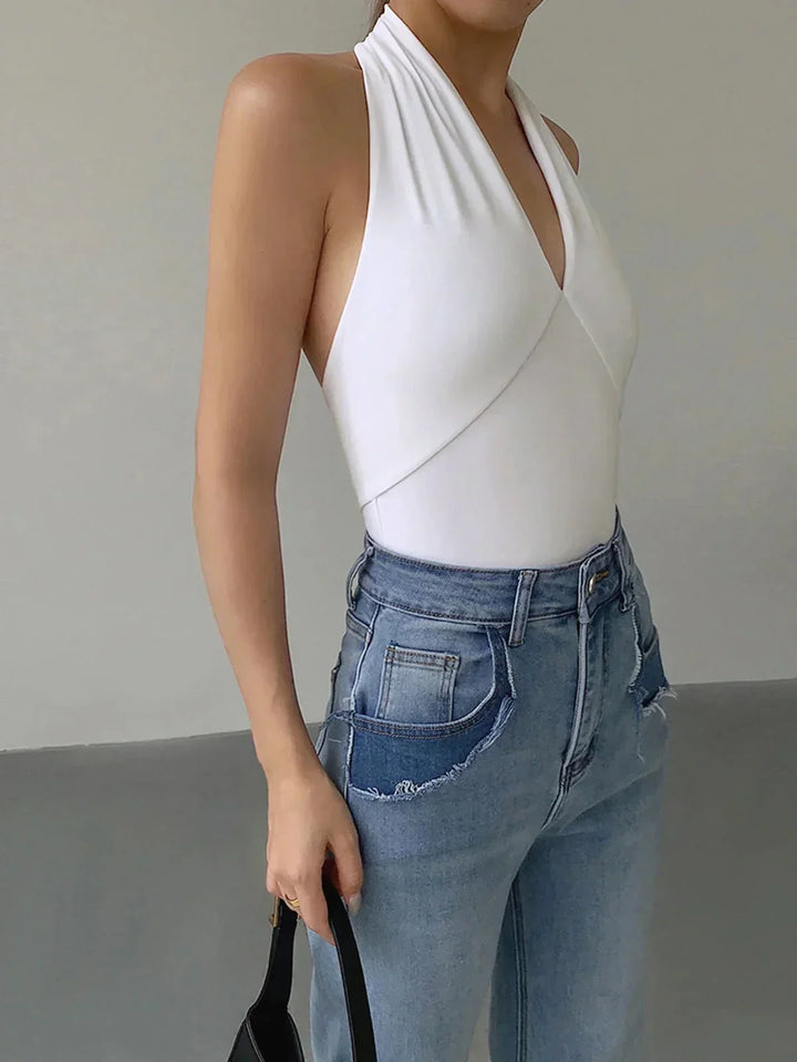 Comfortable women's sleeveless halter top. Features a flattering V-neck, perfect for elegant or casual summer styles.