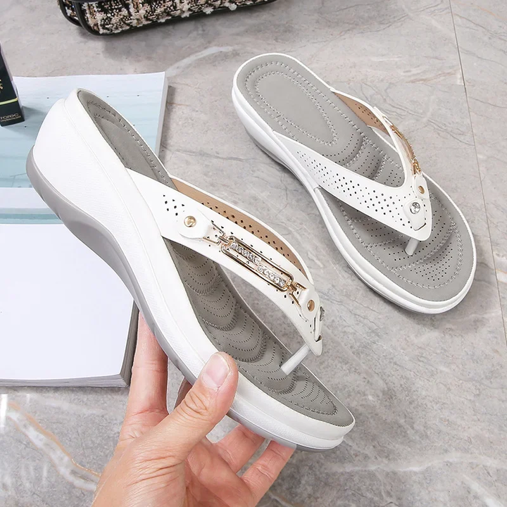 Women's cushioned flip flop sandals with a decorative strap for ultimate comfort and stylish everyday wear.