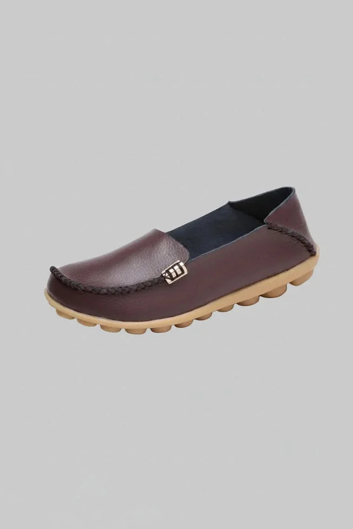 Everyday women's flats, slip-on style, round toe, cushioned for all-day comfort.