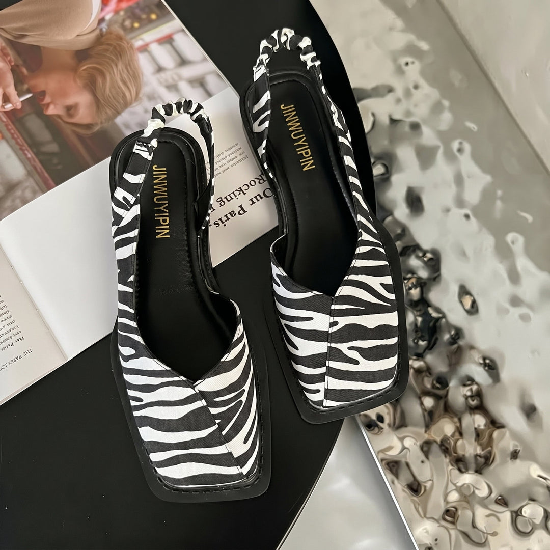 Elegant women's daisy print square toe slingback block heel sandals. Ideal spring fashion & summer footwear.
