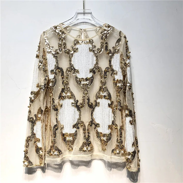 Dazzling sequin women's top. Shimmering, glamorous party wear, perfect for a chic evening fashion look.
