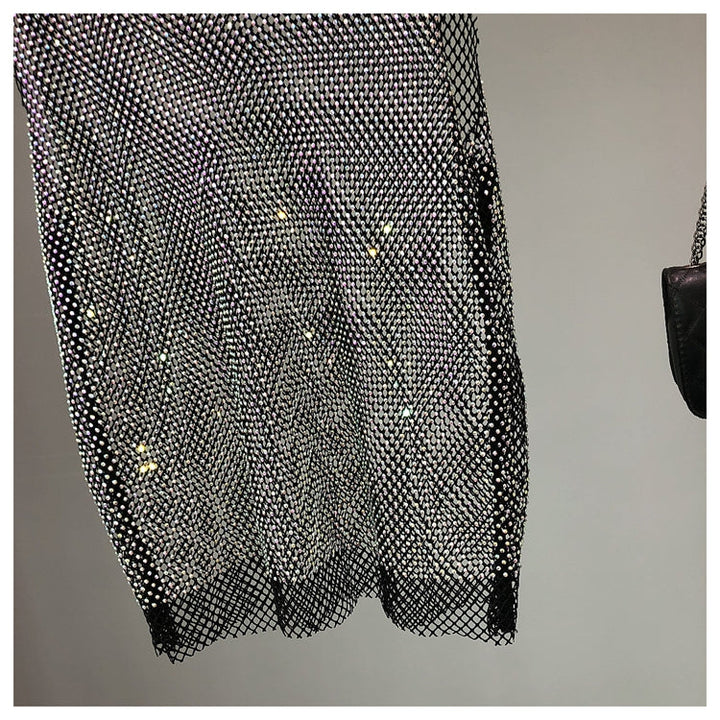 Dazzling rhinestone sleeveless tank top for women, perfect for stylish party wear.