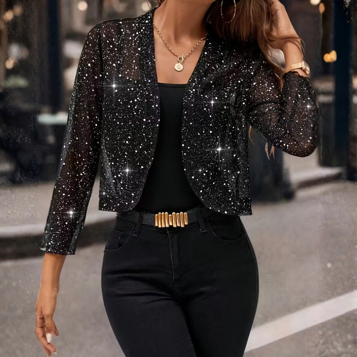 Sparkle women's sequin cardigan. Dazzling party jacket for evening wear. Glamorous shimmer top with long sleeves.