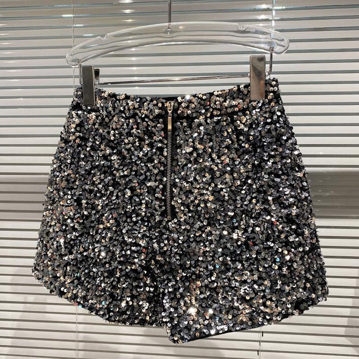 Trendy silver glitter high-waist women's shorts, offering a dazzling shine for parties & fashion. Bling apparel.