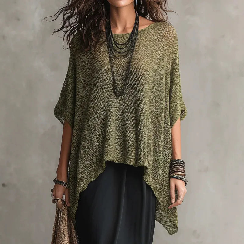 Stylish women's boat neck poncho top, featuring a draped asymmetrical hem & soft knit texture for versatile casual wear.