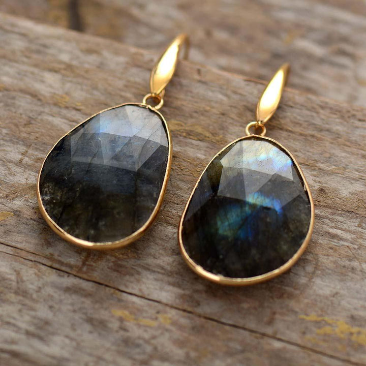 Elegant women's dangle earrings with genuine labradorite healing stones, a unique handcrafted spiritual gemstone jewelry.