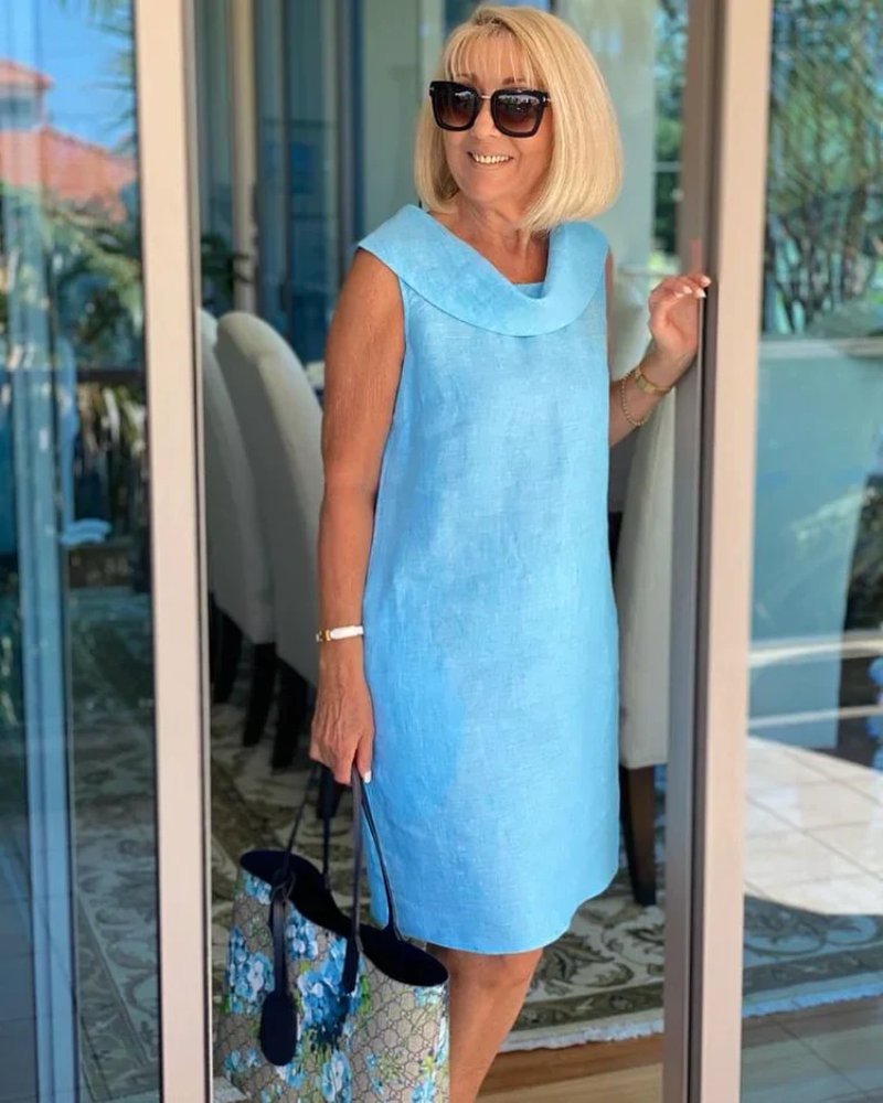 Sleeveless casual shift dress with cowl neck, perfect for summer brunches, vacations, or everyday comfort.