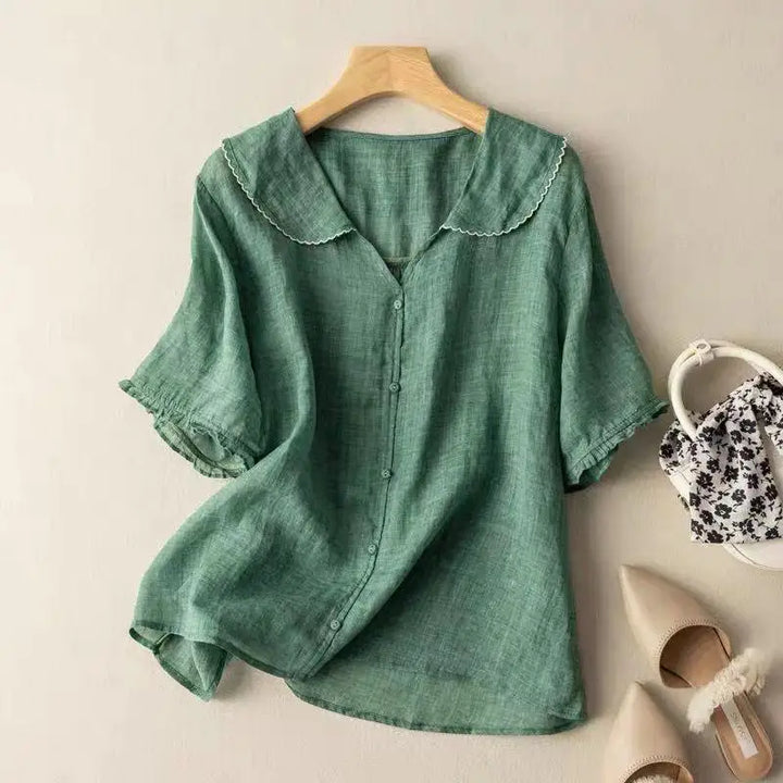 Effortless women's breathable linen blouse, a lightweight and stylish top for summer comfort.