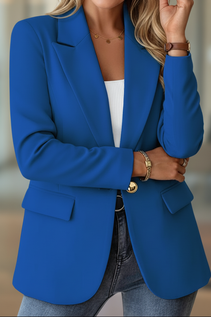 Model wearing a relaxed women's blazer, styled for a sophisticated casual chic look.
