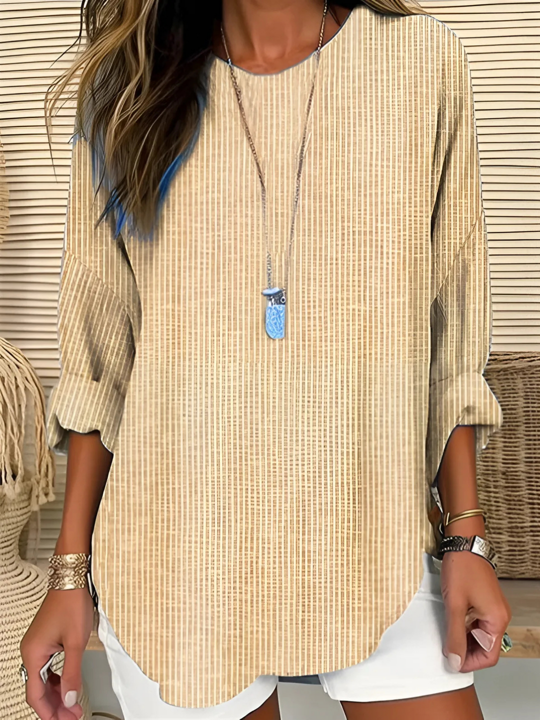 Chic women's striped long sleeve blouse with a comfortable, versatile relaxed fit for everyday wear.
