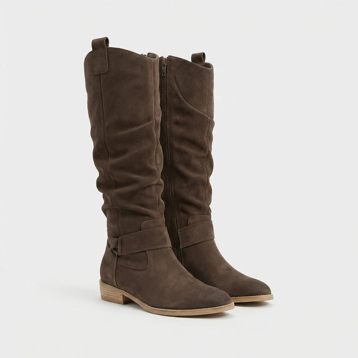 Elegant women's knee-high boots with side zipper, comfortable block heel, and classic style for winter fashion.
