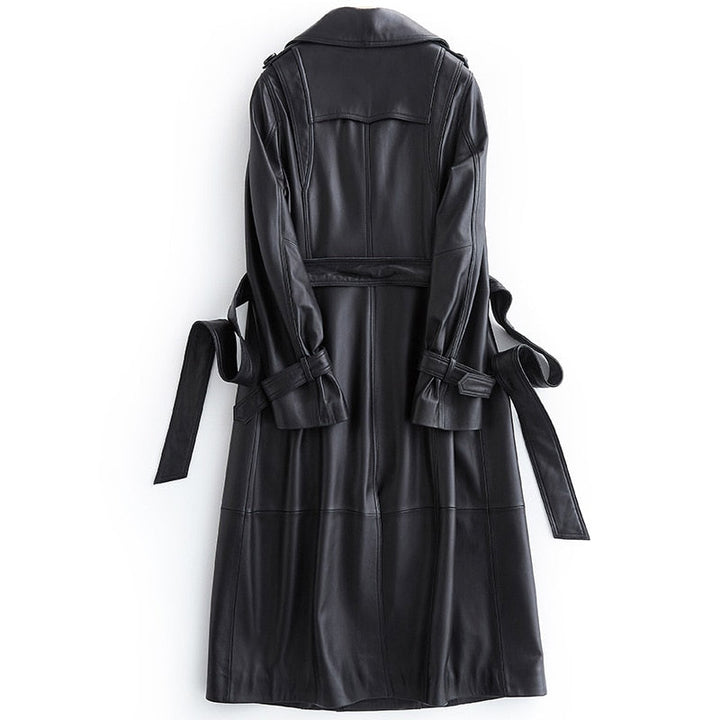 Chic black long trench coat for women, versatile fall fashion & spring jacket, ideal for elegant outerwear styles.