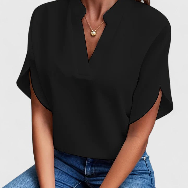 Chic women's blouse, perfect for spring/summer work wear or elegant casual style.