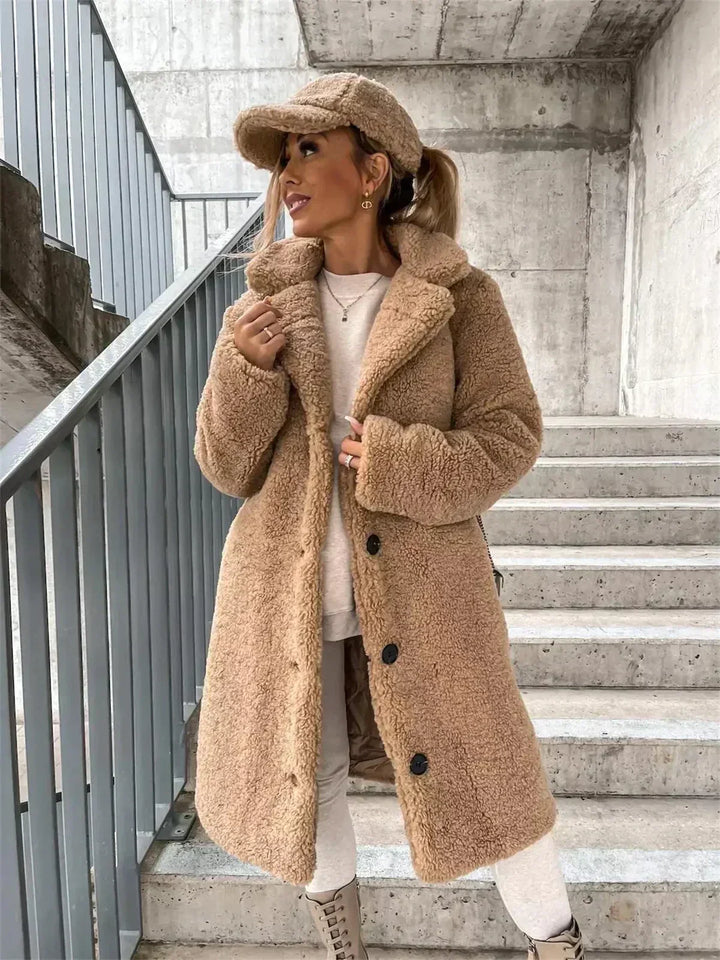 Women's elegant casual long coat, a versatile timeless layering piece for fall and winter fashion.